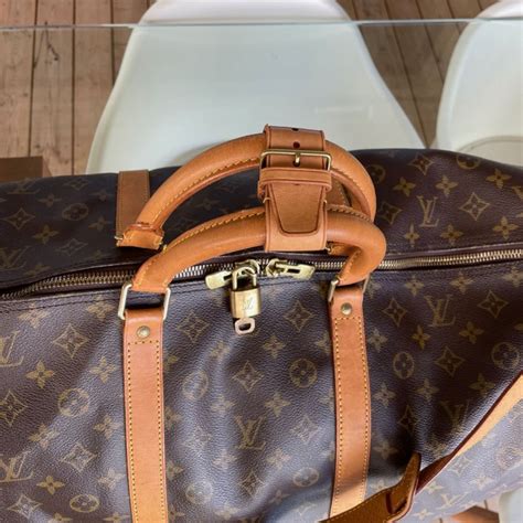 louis vuitton triangle keepall|Keepall Bandoulière 45 .